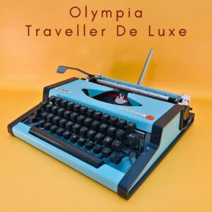 Máquina de escribir funcional con estuche Olympia Traveller De Luxe Cian