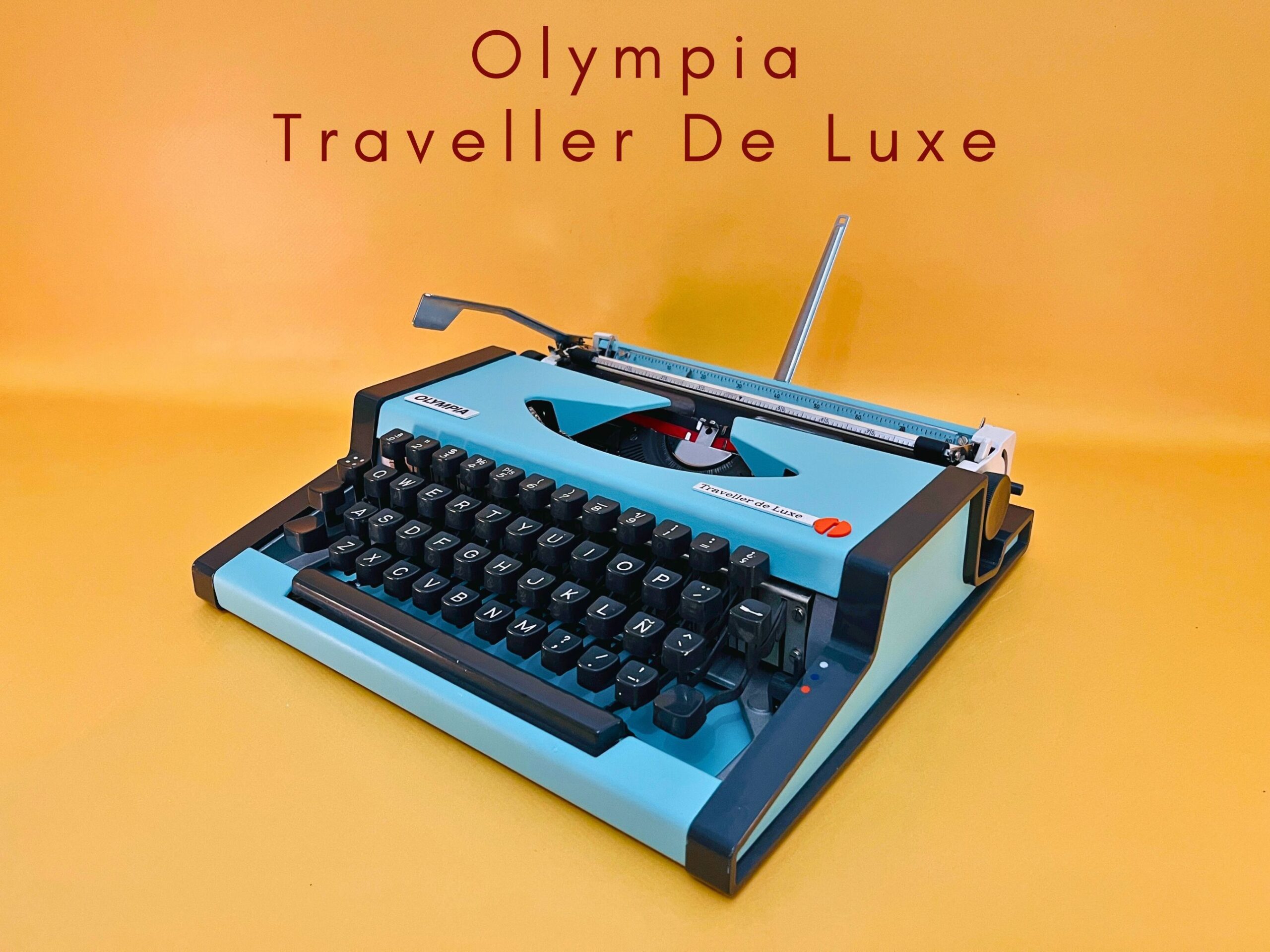 Máquina de escribir funcional con estuche Olympia Traveller De Luxe Cian